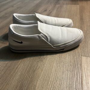 Women’s white Nike slip on shoes